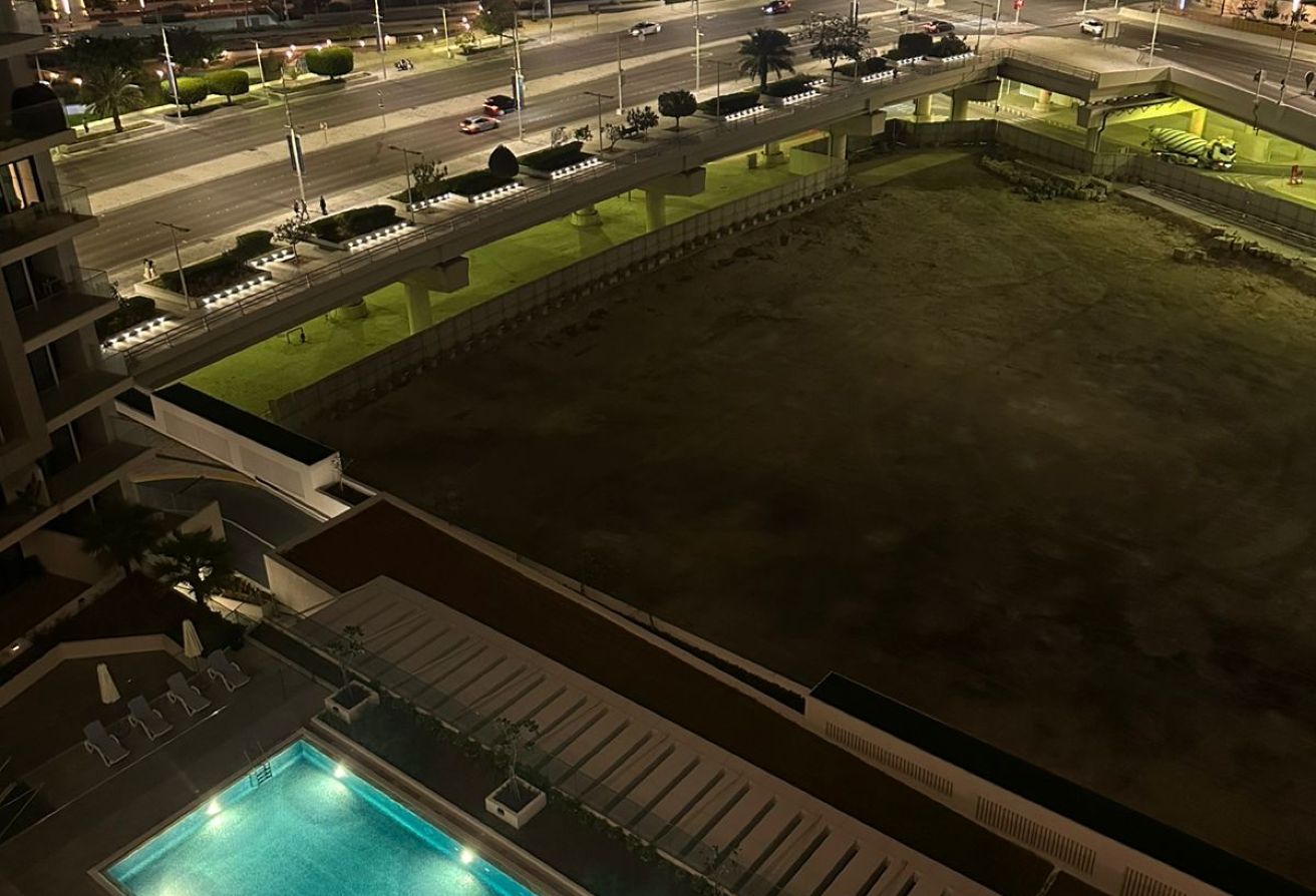 Vacant | Pool + City View | Balcony